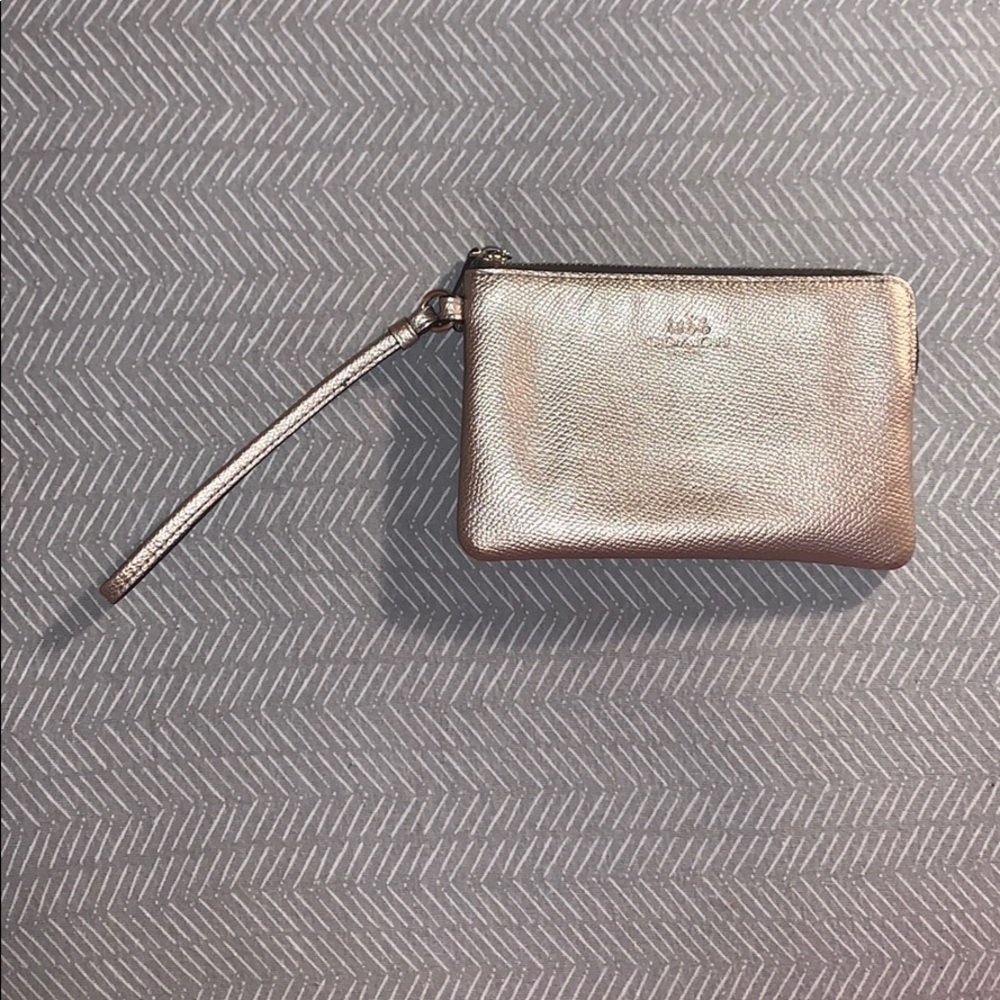Gold coach wristlet